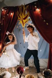 brother and sister performing on stage