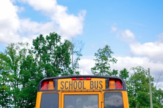 School bus blue sky