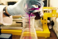 Science Beaker with purple liquid