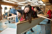 HS shop students building boat