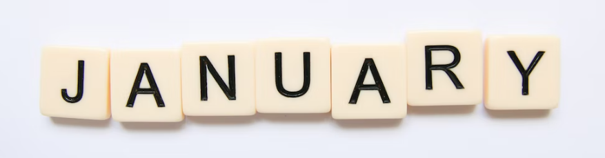 The word January spelled out in letter tiles