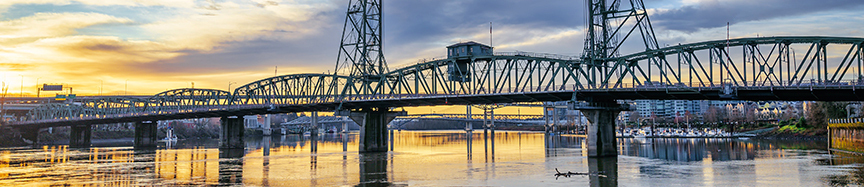 Photo by Brett Sayles: https://www.pexels.com/photo/truss-bridge-over-river-under-sundown-sky-7093851/
