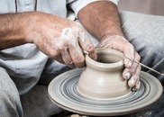 ceramacist throwing a pot