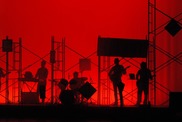 musicians playing in contrast on a theatre stage