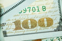 Close up image of 100 dollar bill