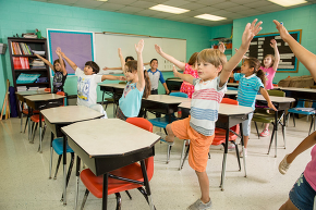 kids doing physical activity in classroom