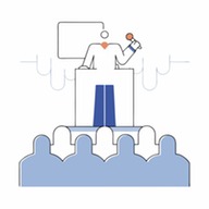 A person standing at a podium with a microphone