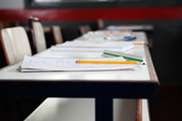 image of a notebook on a classroom desk