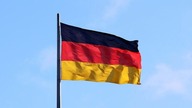 German flag with the sky in the background.