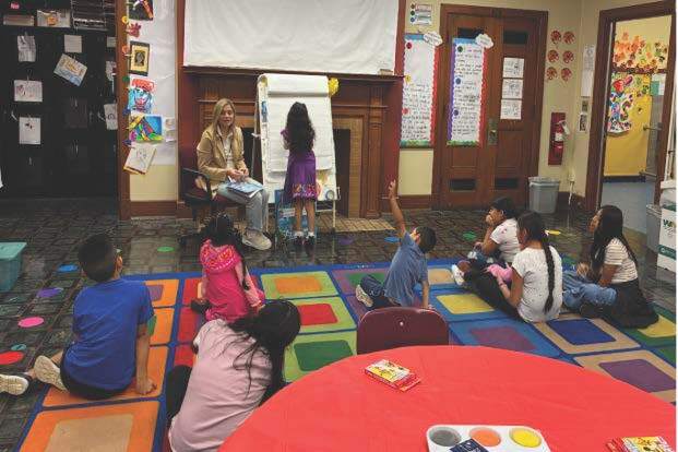 Students in a classroom with a teacher