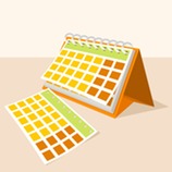 A desk calendar sits on a table