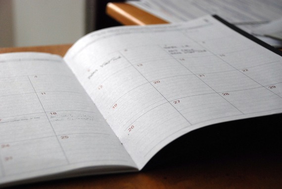 close up of calendar planner, open on desk