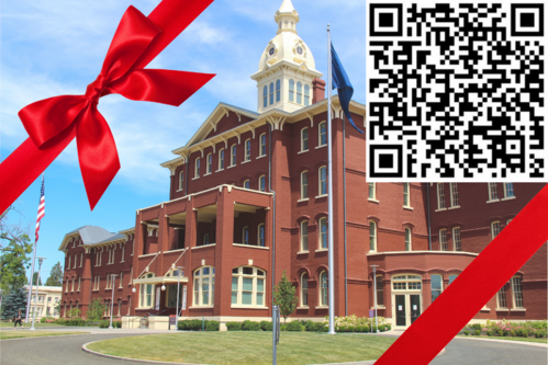 photo of Oregon State Hospital with a red bow on it, and a QR code