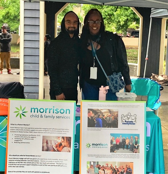 photo of parent mentors Matthew Porter and CeCe Edwards at a community event