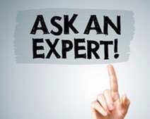 photo with a sign saying Ask an Expert