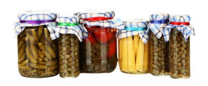 photo of a line of jars with preserved fruits and veggies