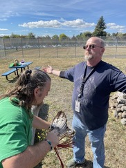 OSH patient Clint Allen smudges OSH Native Services staff member Gerald Weller