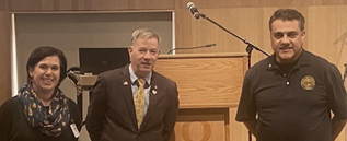 Jesse Eagan, Rep. Rob Nosse and Bernardino De La Torre onstage at the Oct. 28 symposium