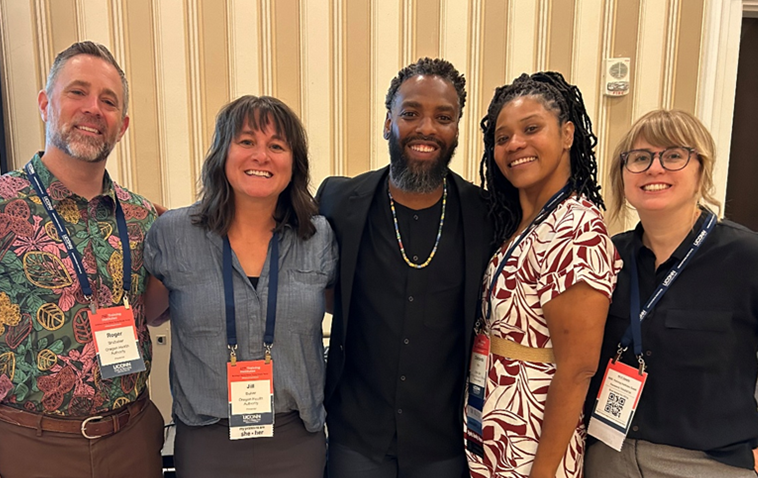 OHA staff with Dr. Kenjus Watson at University of Connecticut's 2025 Training Institutes