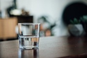 A glass of water on a table