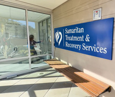 Exterior photo of sign and entryway of Samaritan Treatment & Recovery Services facility