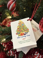 Caring Tree 2025 gift tag up close