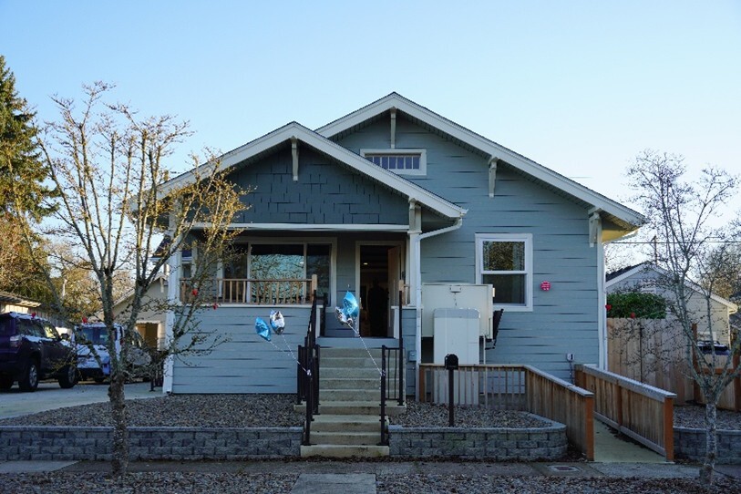 Exterior of Juniper Street Young Adult in Transition Residential Treatment Home, decorated for Valentine's Day