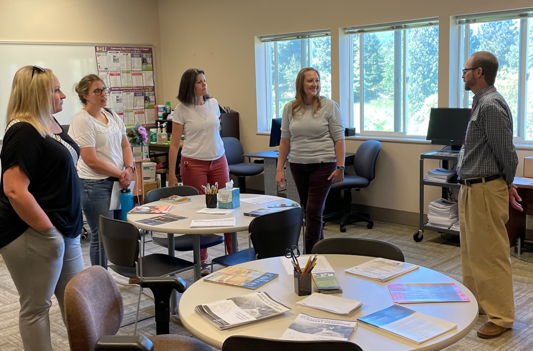 Left to right: Kristyn Fix, Staci Calkins, Heather Ficht, Teresa Cummings-Weir, Mike Scroggs meet at East Cascade Works.