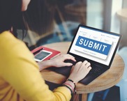 Woman with laptop and submit
