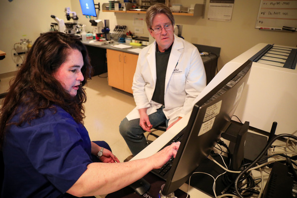 OHSU students, in lab