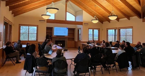 Hillsboro Police and area service providers gather in a room to learn more about resources and services for unhoused individuals.