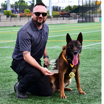 Officer Matt Schmidt and K-9 Blazer with Award
