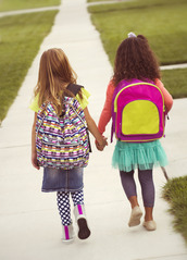 Girls with Backpacks Walking to School