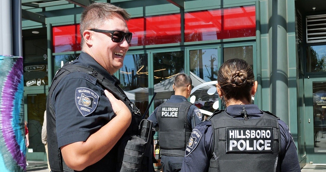 Police Officers Walking Around an Outdoor Event