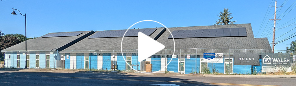 Year-round shelter with video play button