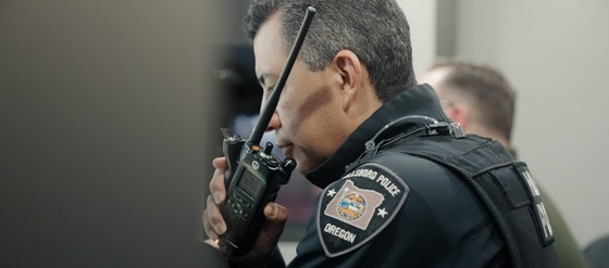 Officer Talking on a Portable Radio