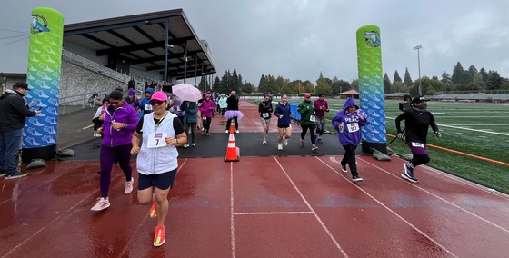 Runners on the track at Run for Hope