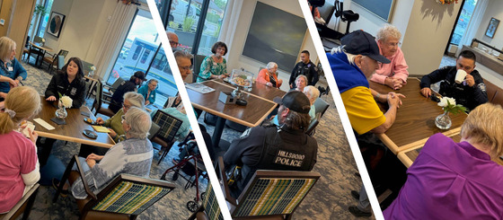 Hillsboro Police Officers and Professional Staff talking with residents.