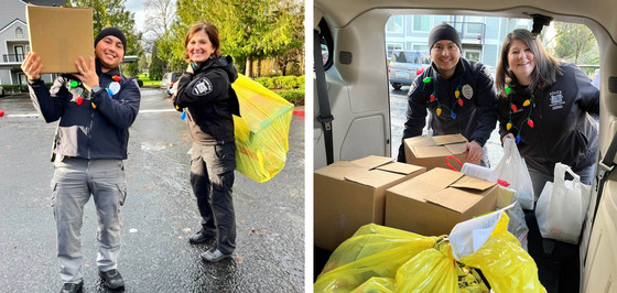 Hillsboro Police staff delivering boxes and bags of food and gifts.