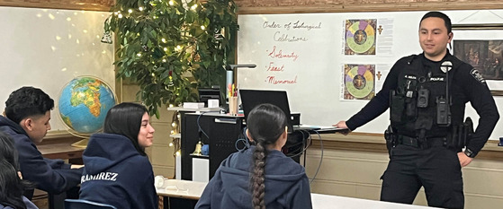 Hillsboro Police Officer Talking with Students in a Classroom