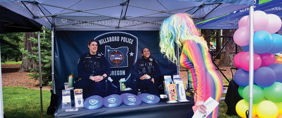 Officers Talking with Someone at the Hillsboro Police Booth