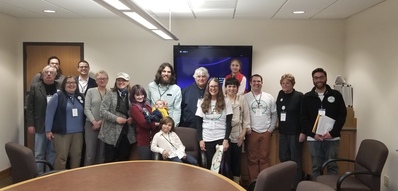 Rep. Mitchell with constituents supporting the Clean Energy Jobs bill.