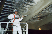 Contractor applying fireproofing image