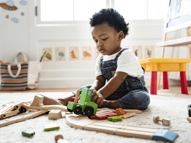 Child playing with toys