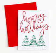 happy holidays red card with trees