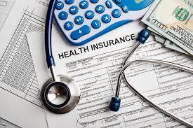 stethoscope and health insurance paperwork