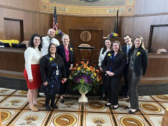 Senator Lieber with her staff at the Senate Rostrum on Opening Day  
