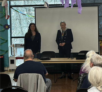 Senator Lieber and Representative Grayber speaking to a group 