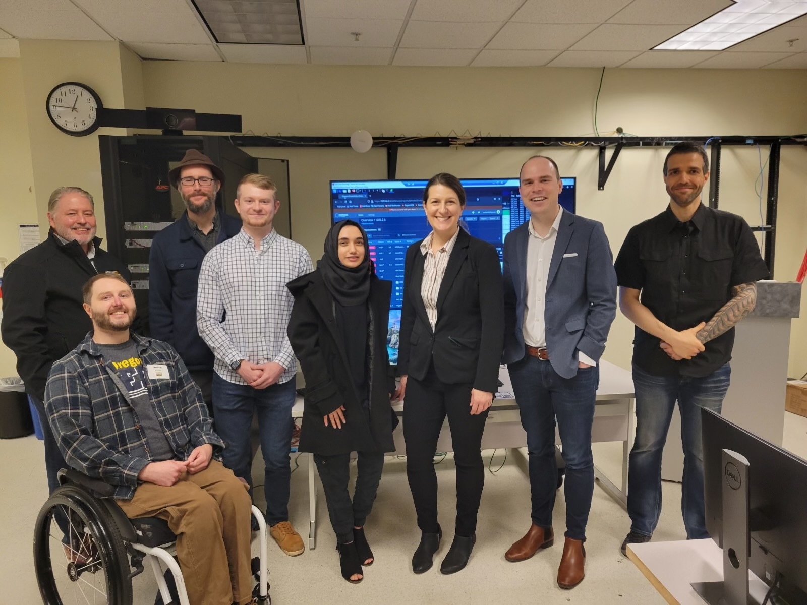Representative Neron and I at a cybersecurity demonstration with OIT students