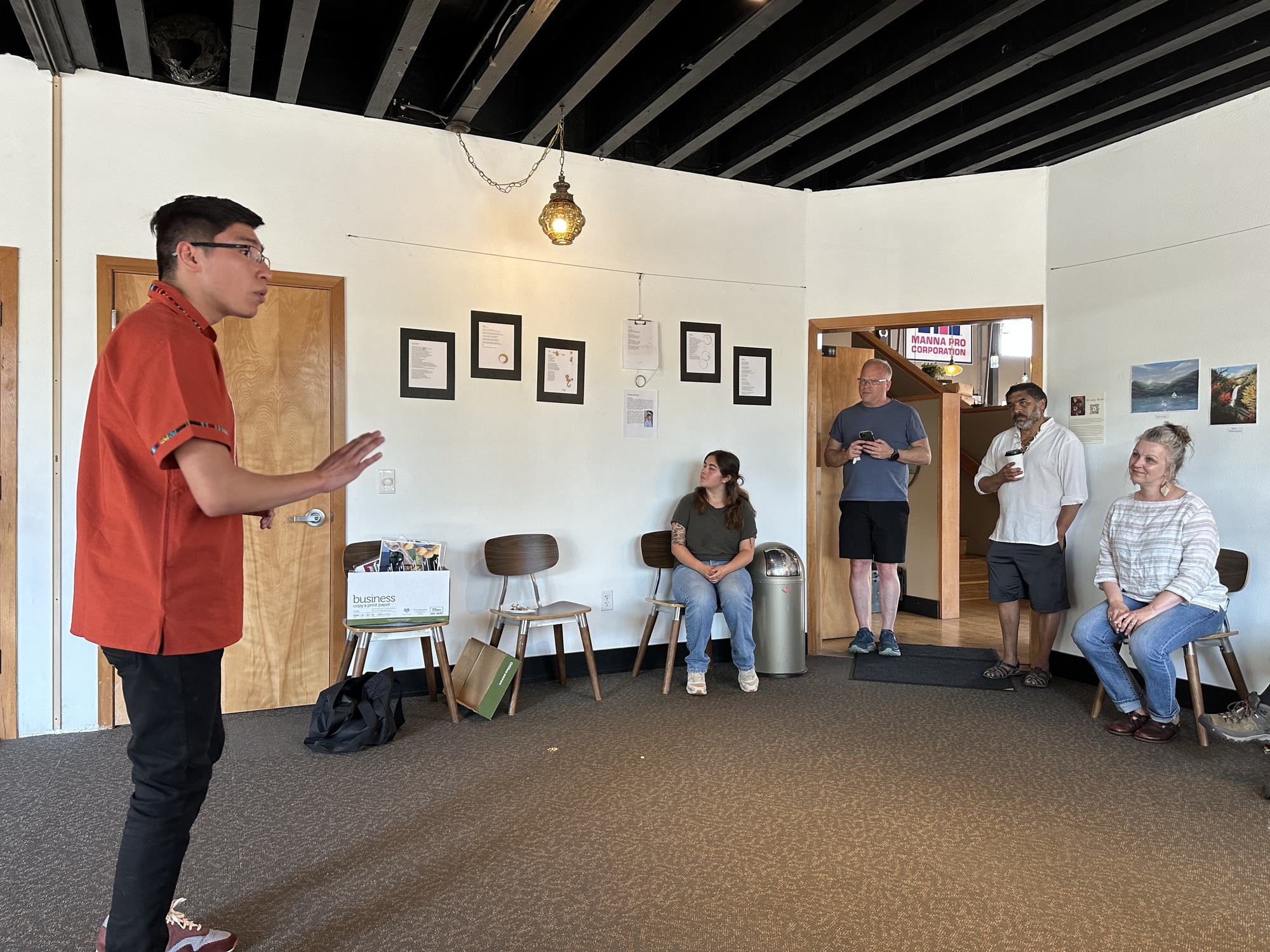 Oscar sharing some of his recent poetry at Symposium Coffee